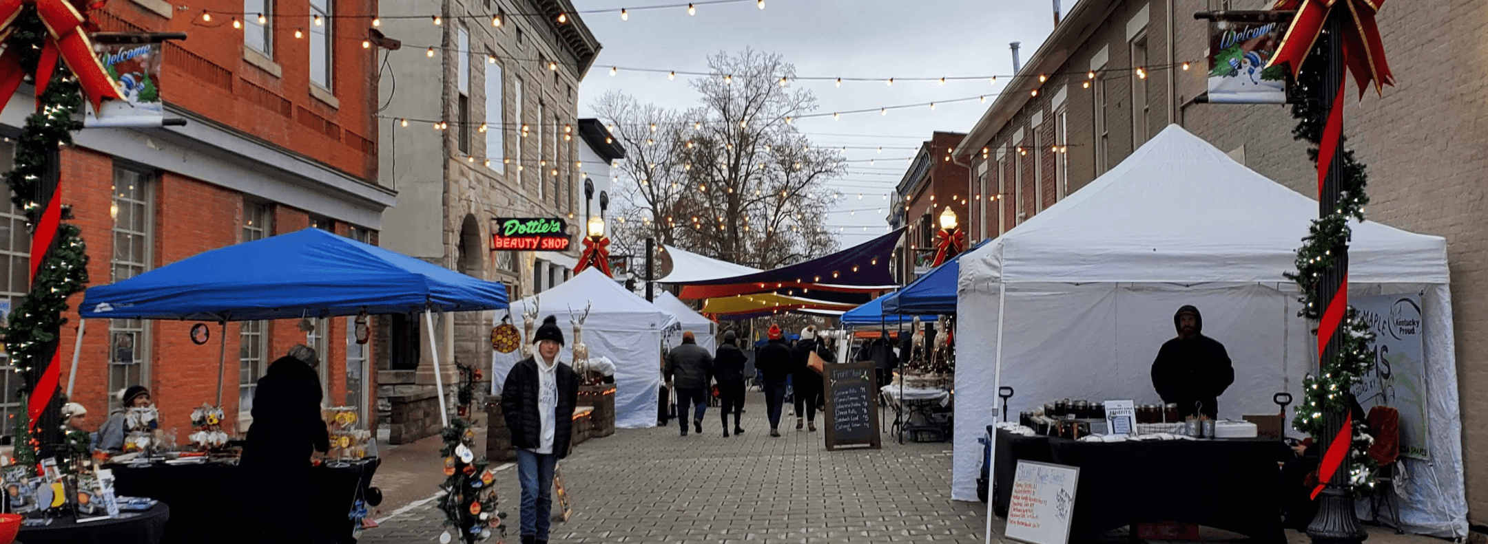 Holiday lights and vendor tents at a previous Celebration of Lights in downtown Shelbyville.